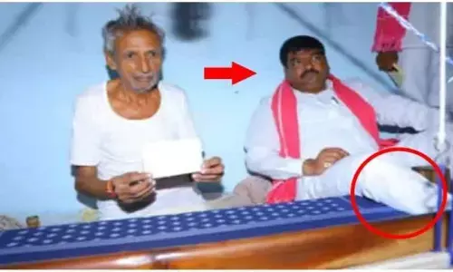 The pic that went viral on social media. Warangal East MLA Nannapuneni Narender is seen with his legs on a maggam (floor loom)