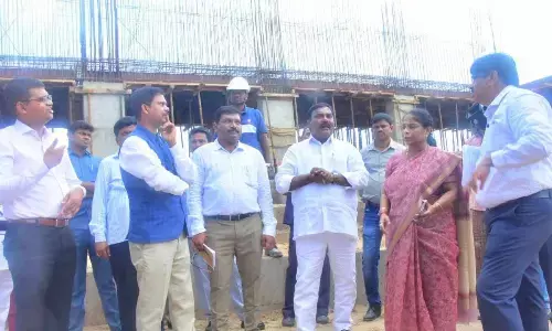 Social Welfare Minister Merugu Nagarjuna along with the officials inspecting the works of Dr BR Ambedkar Memorial at Swarajya Maidan in Vijayawada on Wednesday. Social welfare department principal secretary R Jayalakshmi and District Collector S Dilli Rao are also seen