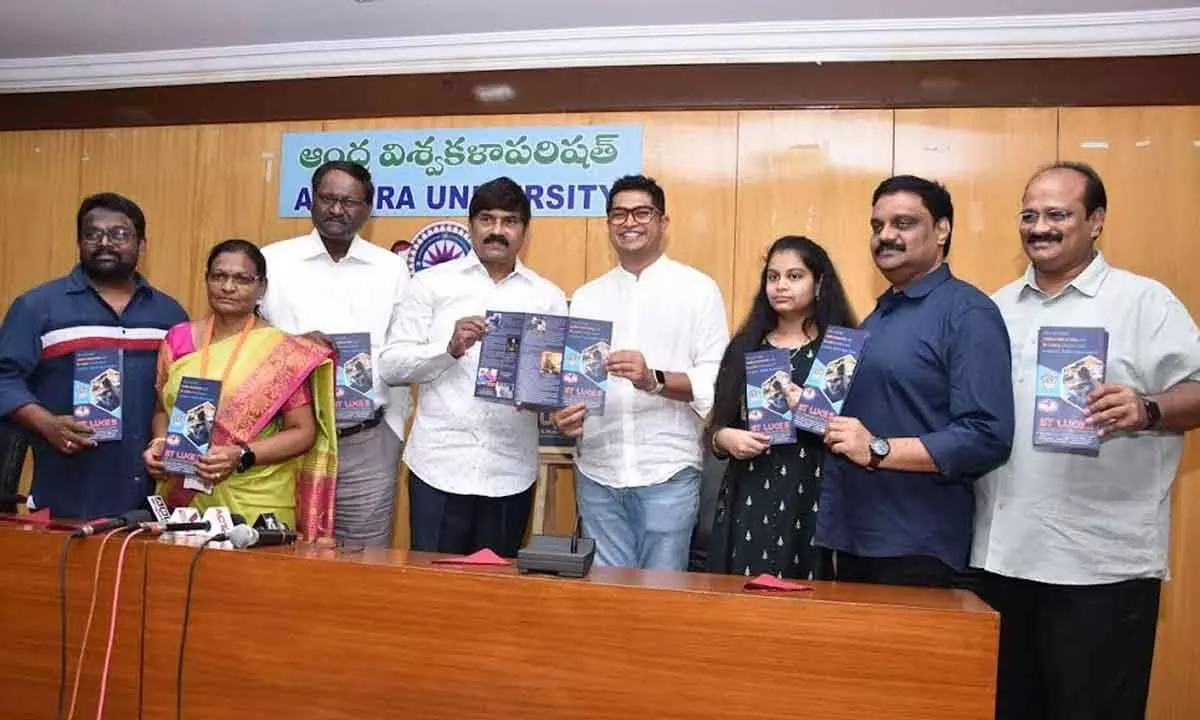 AU VC PVGD Prasad Reddy and others unveiling brochure in Visakhapatnam on Friday