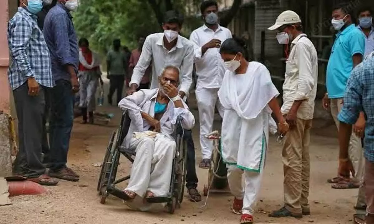 A patient waits for his turn at the GGH in Anantapur outside the casuality.