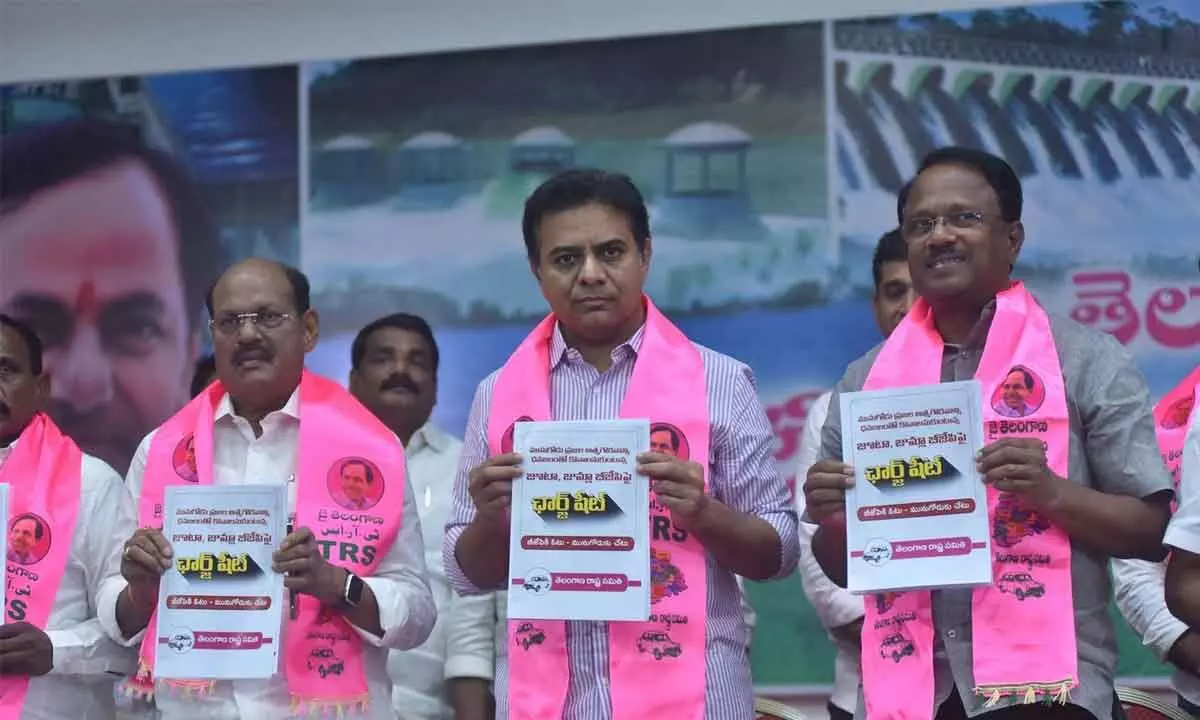 TRS working president KT Rama Rao releasing the charge-sheet against BJP at Telangana Bhavan in Hyderabad on Saturday                       				  Photo:  Adula Krishna