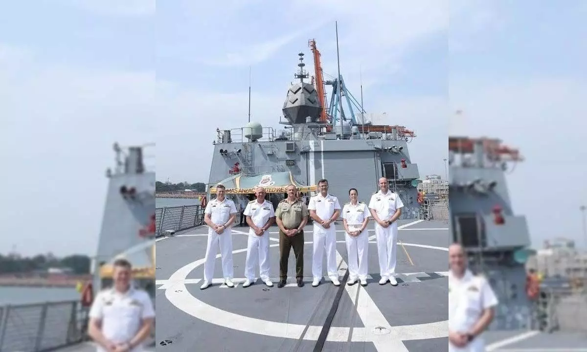 Commander of Australian Fleet Rear Admiral Jonathan Earley with other personnel of the RAN onboard HMAS Anzac in Visakhapatnam