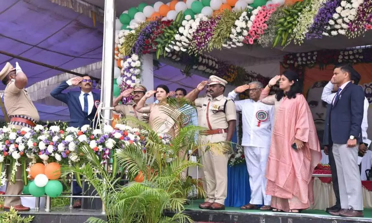 District Collector M Venugoopal Reddy, Government Chief Whip in State Legislative Council Dr Ummareddy Venkateswar`lu and Joint Collector G Rajakumari saluting the national flag in Guntur on Tuesday