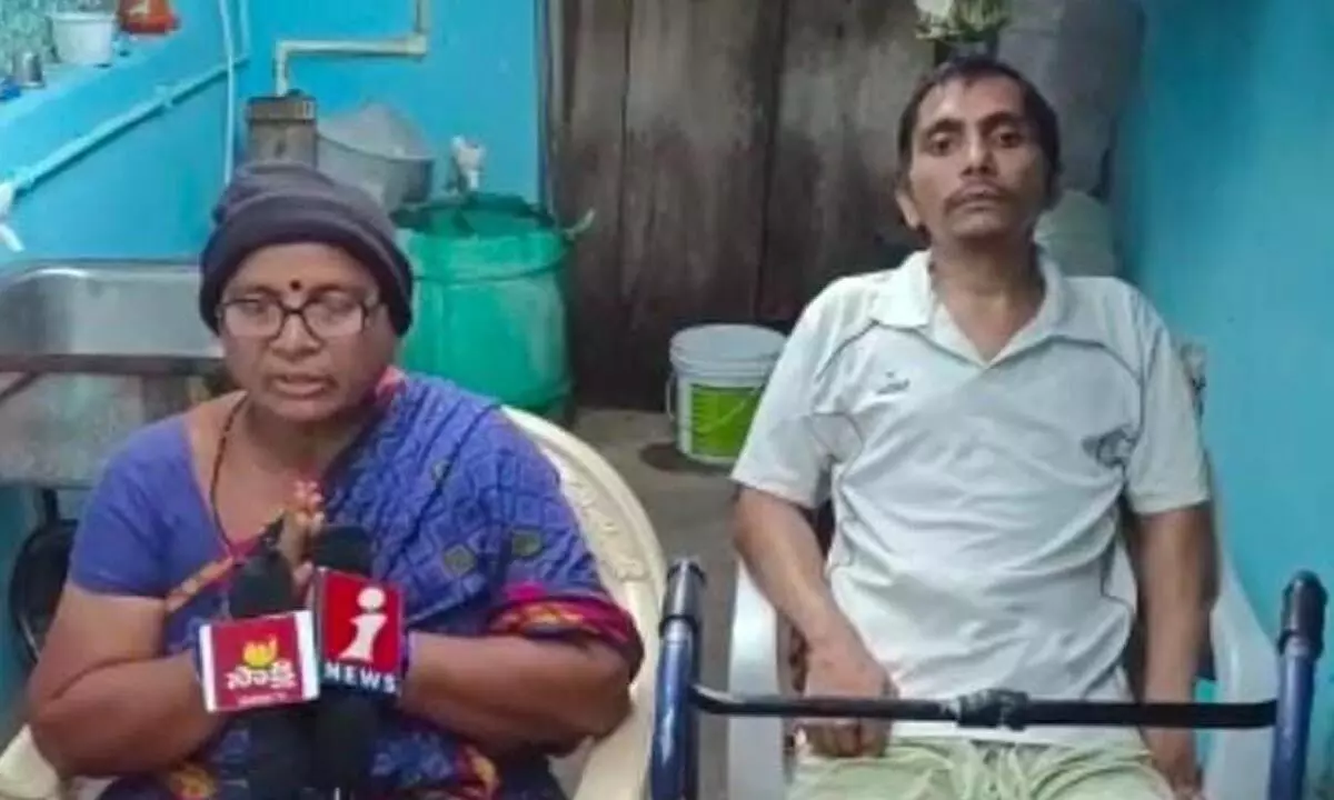 Mirapala Chinnamma addressing the media along with her third son at her house in Annavaram on Wednesday