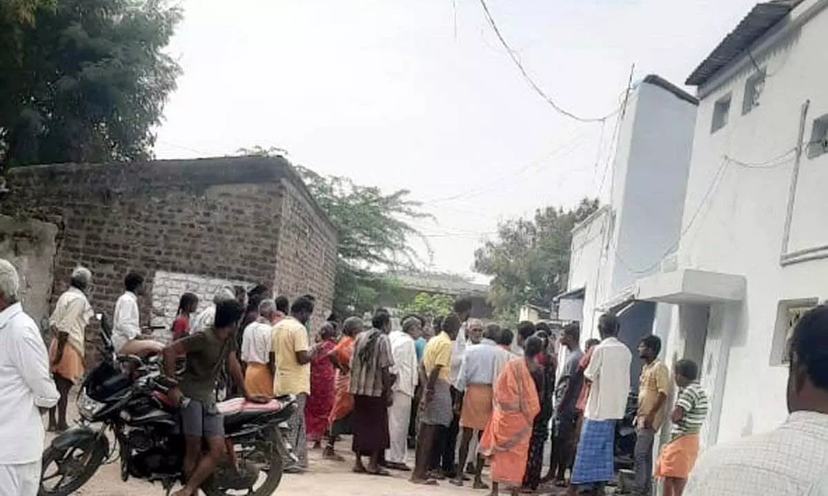 Villagers who could not get money for their votes protesting at a BJP leader’s house in Koratikal village on Wednesday