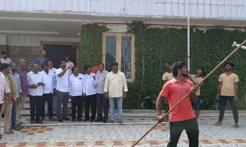 TDP State executive secretary Adireddy Srinivas and others supervising the arrangements for the joint East Godavari district-level party meeting at SV Function Hall in Rajahmundry on Wednesday