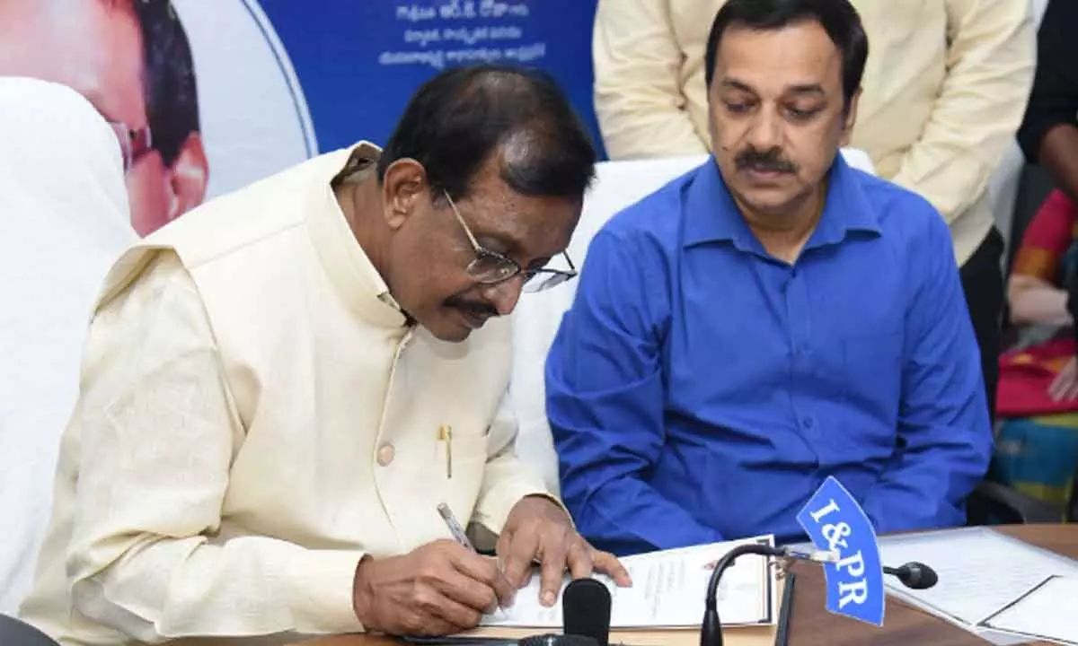 P Vijaya Babu assumes office as the chairman of Official Language Commission at the Secretariat on Thursday. Special CS, cultural affairs department, Rajat Bhargava is also seen.
