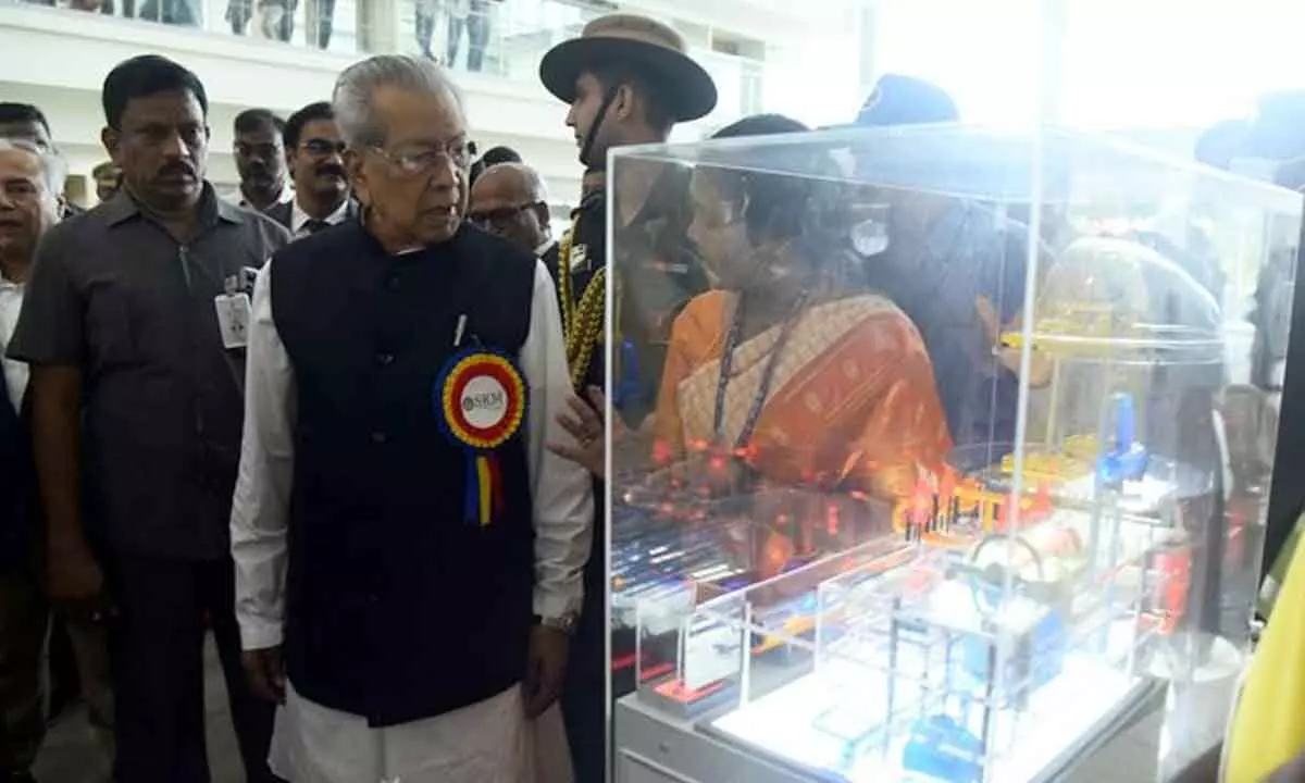 Governor Biswabhusan Harichandan observing a science model at ISRO & DAE Exhibition at SRM University near Mangalagiri on Thursday Photo: Ch Venkata Mastan