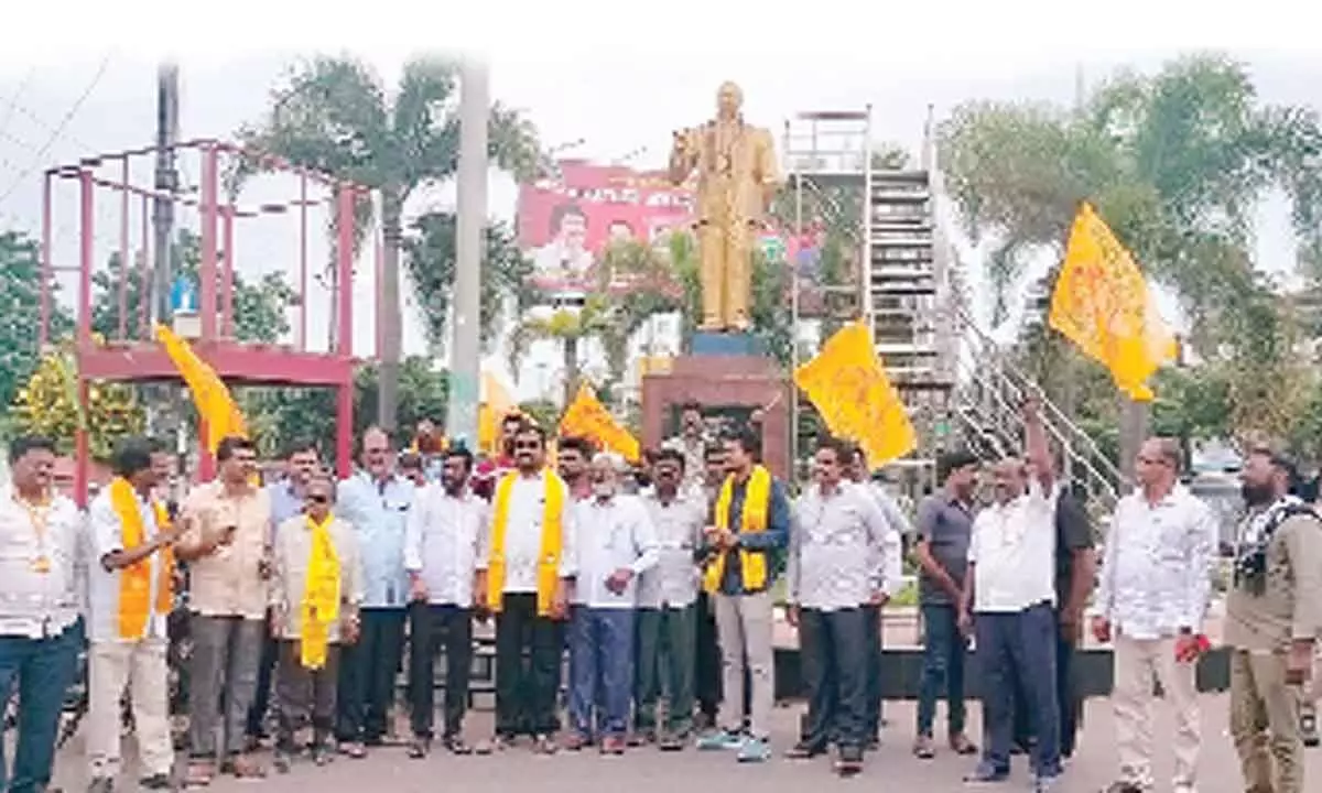 TDP leaders staging a protest condemning the arrest of senior leader Ayyanna Patrudu, in Kakinada on Thursday