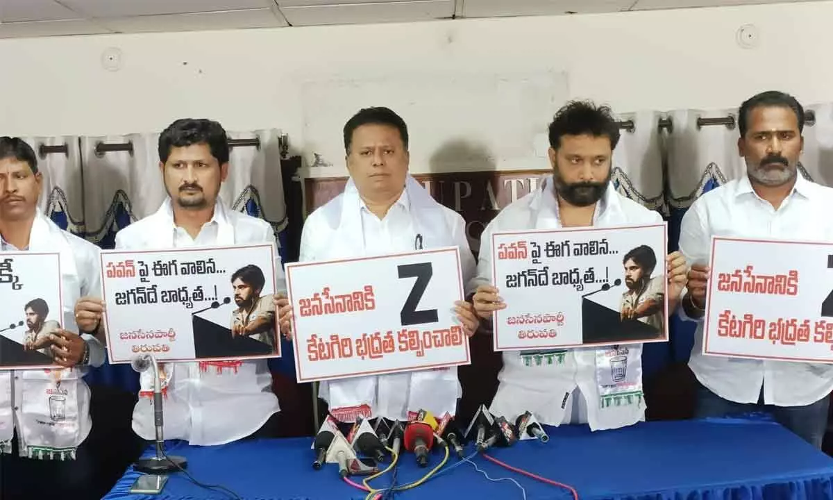 Jana Sena Party leaders speaking to media in Tirupati on Thursday displaying placards seeking ‘Z’ plus category security for Pawan Kalyan