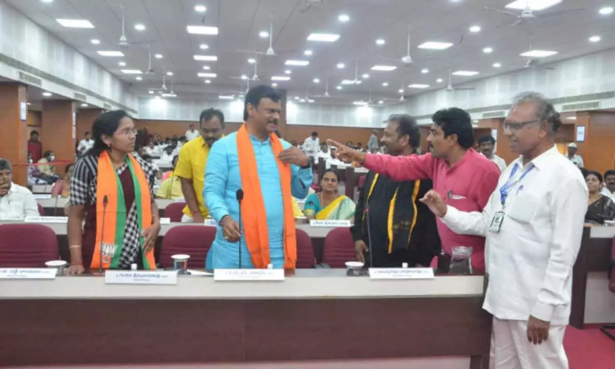 Left Party leaders arguing with BJP MLC PVN Madhav in council meeting held in Visakhapatnam on Friday