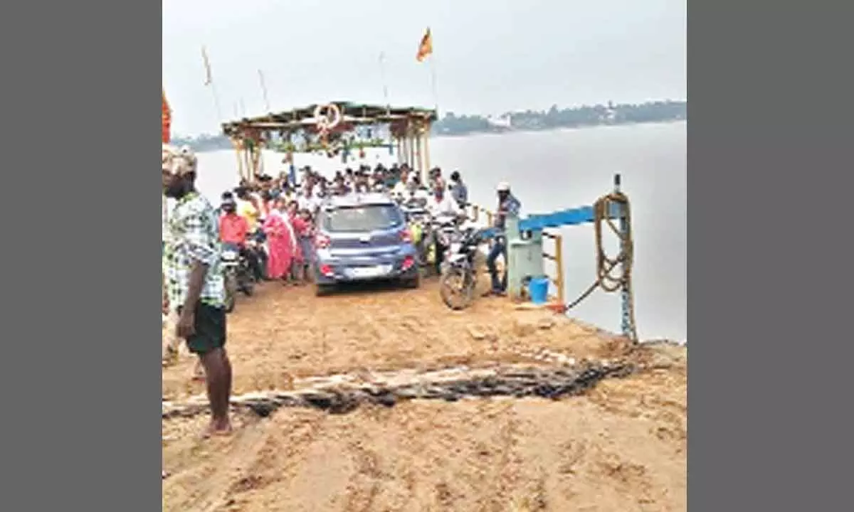 A ferry carrying commuters and vehicles to Mukteswaram ghat from Kotipalli ghat on Vasishta tributary of Godavari River
