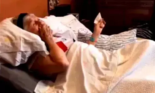 People were moved to tears seeing a trending video of an elderly womans response to receiving a surprise from her favourite band.