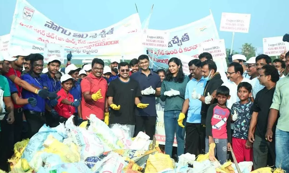 District Collector A Mallikarjuna and other department officials at the beach clean-up drive held in Visakhapatnam on Sunday