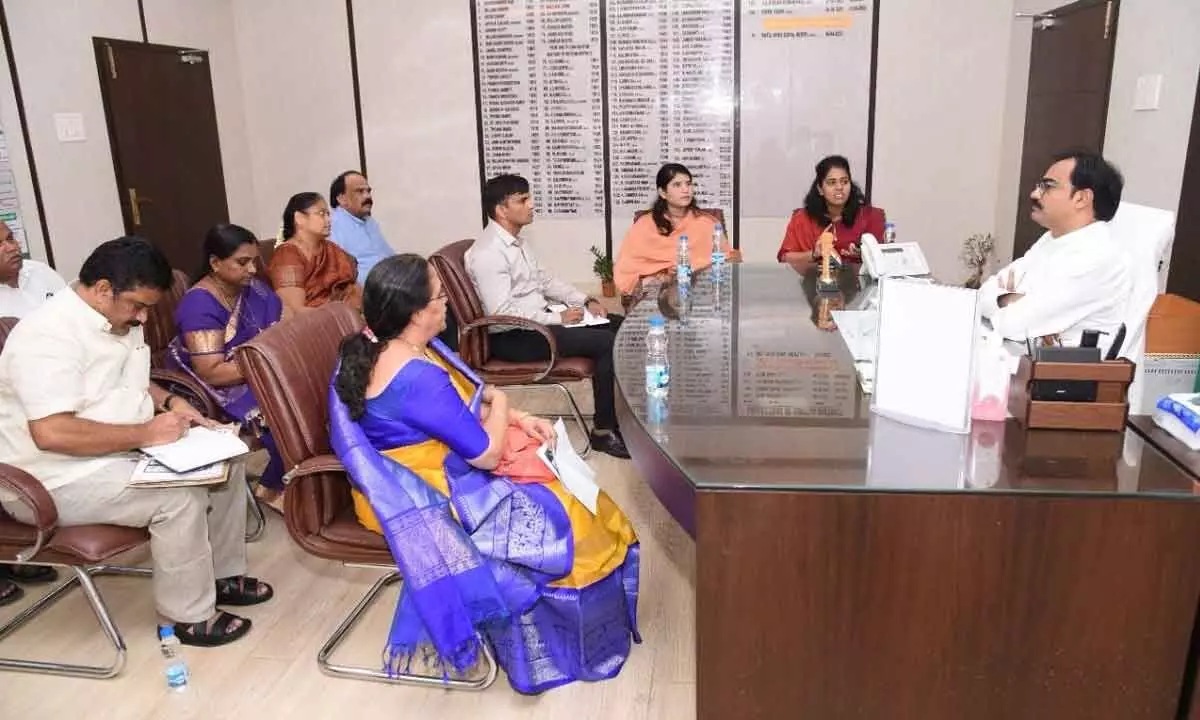 District Collector M Venugopal Reddy addressing a review meeting at his office in Guntur on Tuesday. Joint Collector G Rajakumari and GMC Commissioner Kirthi Chekuri are also seen.