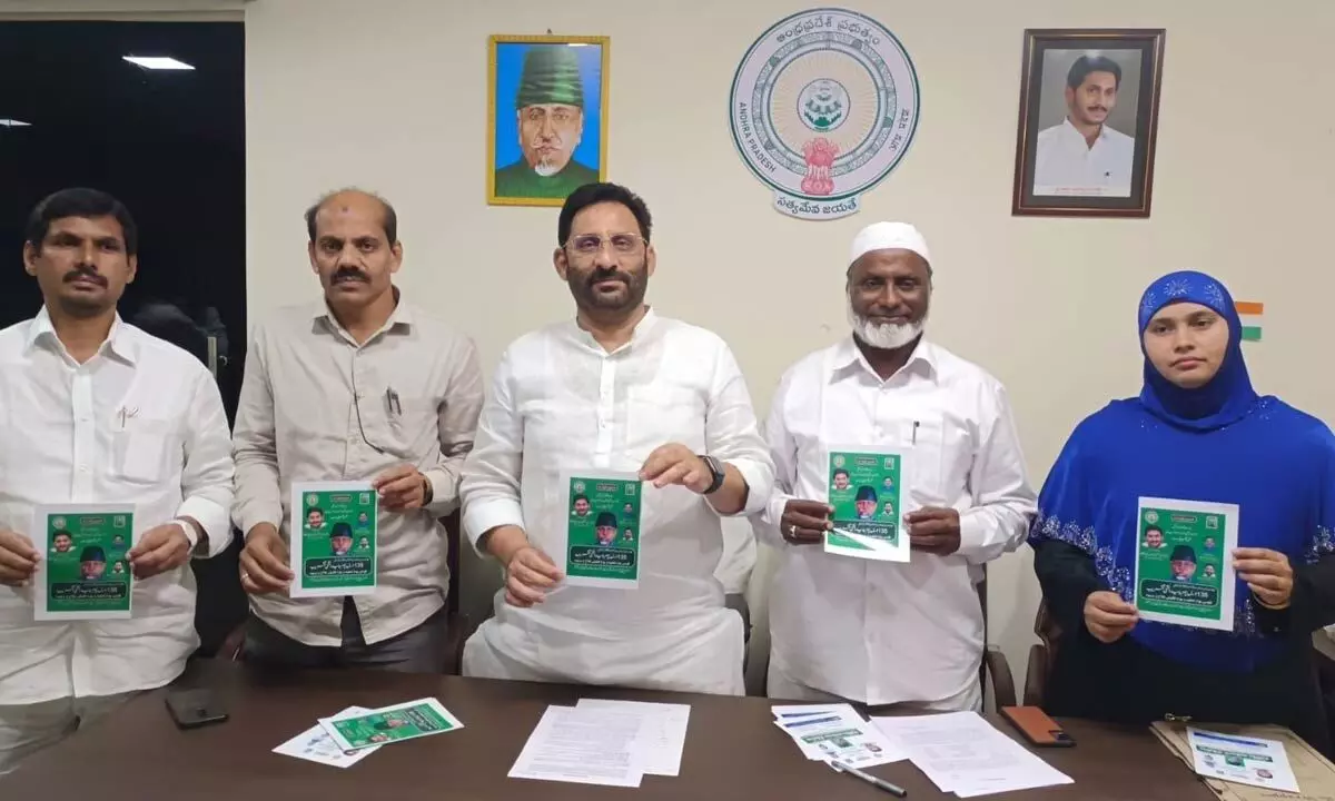 AP Urdu Academy chairman Nadeem Ahmed and others releasing a brochure on National Minorities Welfare Day in Vijayawada on Wednesday