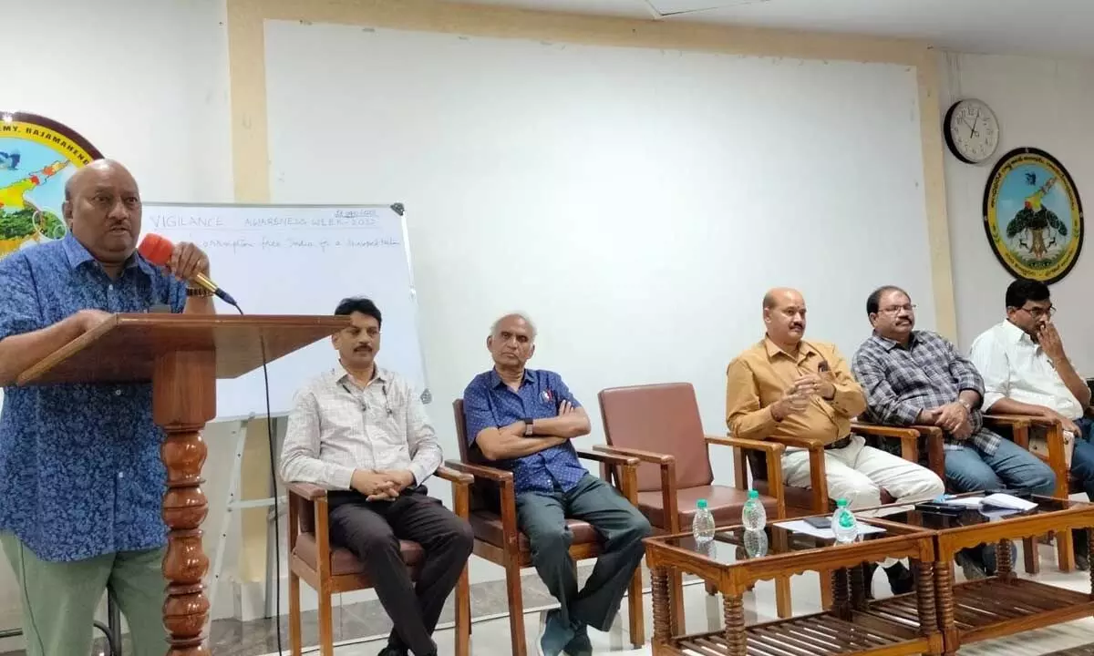 AP State Forest Academy Director PAV Udaya Bhaskar speaking at an awareness programme at Forest Academy in Rajamahendravaram on Wednesday