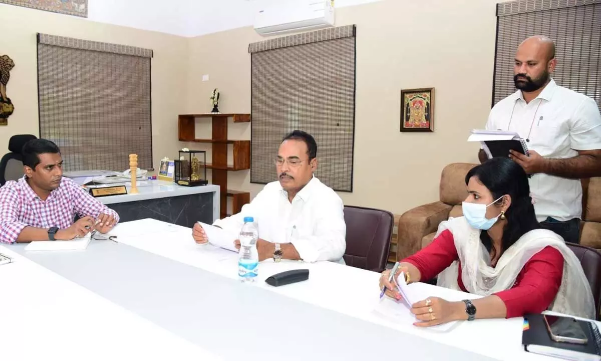 District Collector M Hari Narayanan holding talks with MLA A Srinivasulu and Municipal Commissioner Dr J Aruna at the Collectorate in Chittoor on Thursday