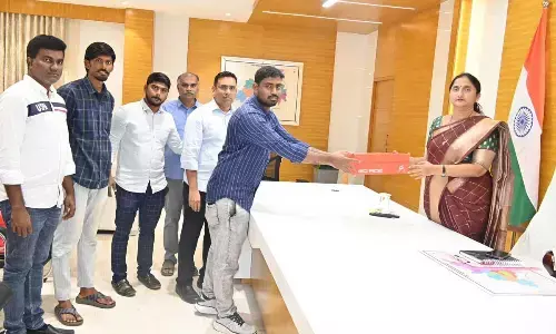 District Collector Madhavi Lata distributing sports equipment to sportspersons in Rajamahendravaram on Thursday
