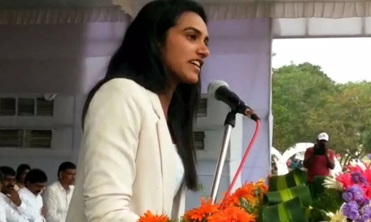 Indian shuttler PV Sindhu addressing the inaugural meeting of 6th AP State Revenue Sports and Cultural Meet at ANU in Guntur on Friday