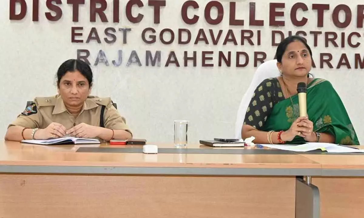 District Collector K Madhavi Latha and SEB Joint Director M Ramadevi participating in an emergency meeting at the Collectorate in Rajamahendravaram on Friday