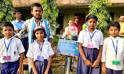 Yoga teacher cycling his way with twin noble causes