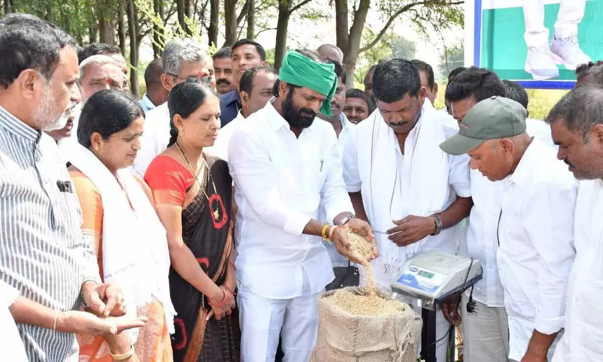Minister Srinivas Goud inaugurating a paddy procurement centre in Divitipally village in Mahabubngar on Sunday