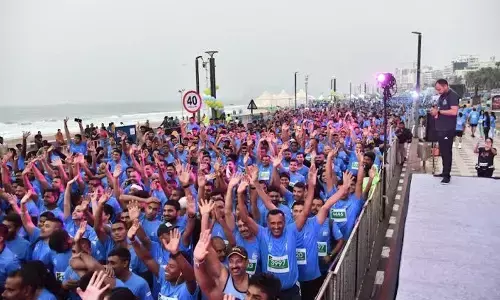 Participants at the Vizag Navy Marathon held in Visakhapatnam on Sunday