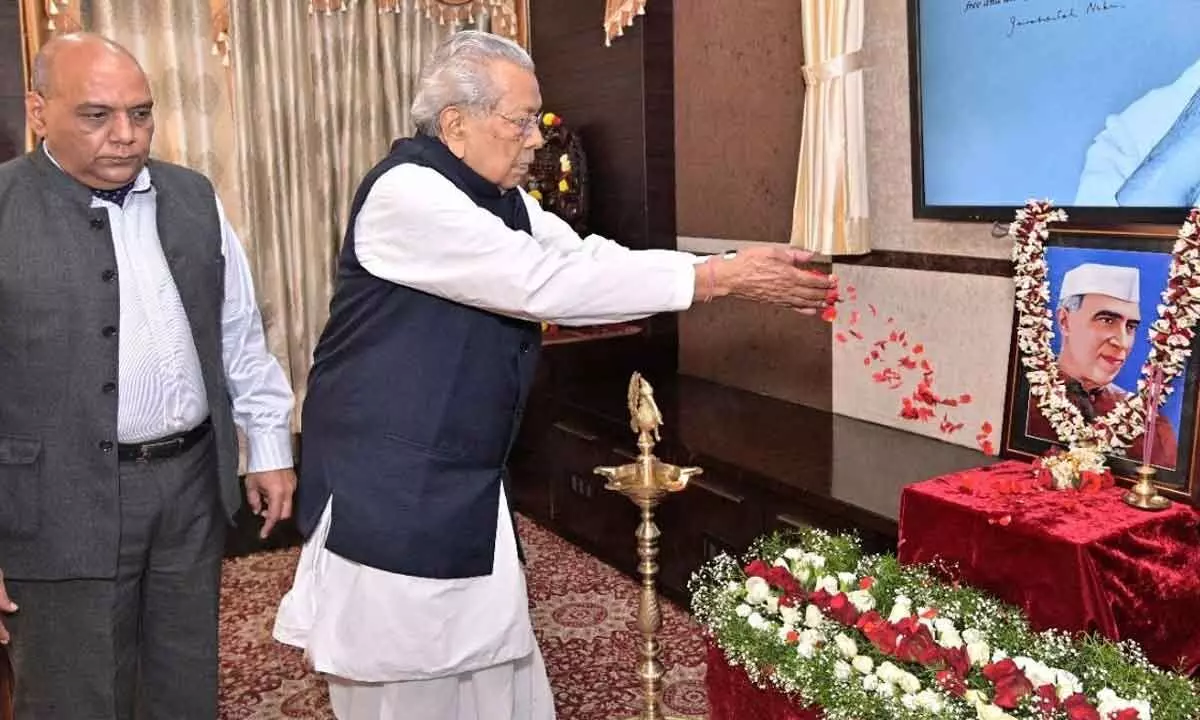 Governor Biswabhusan Harichandan pays floral tributes to Pandit Jawaharlal Nehru on his birth anniversary at Raj Bhavan on Monday