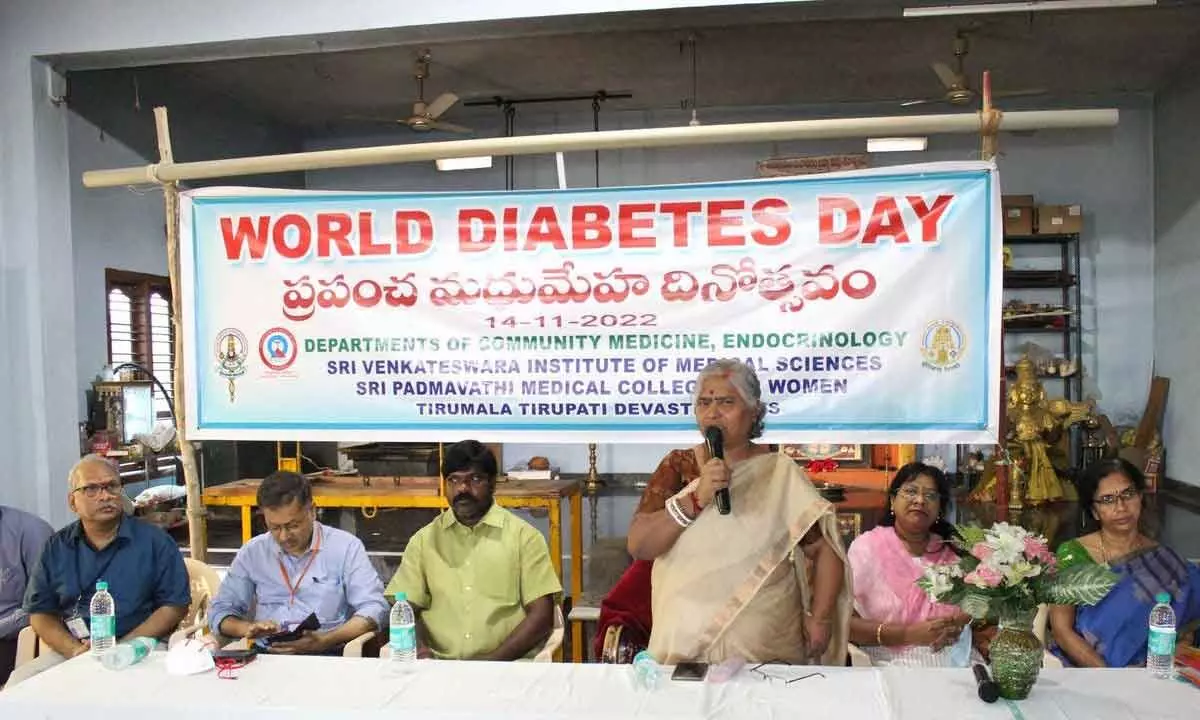 SVIMS Director Dr B Vengamma speaking at a diabetes awareness programme in Nadavalur village on Monday. Dr Alok Sachan,  Dr Nagaraju and others are seen.