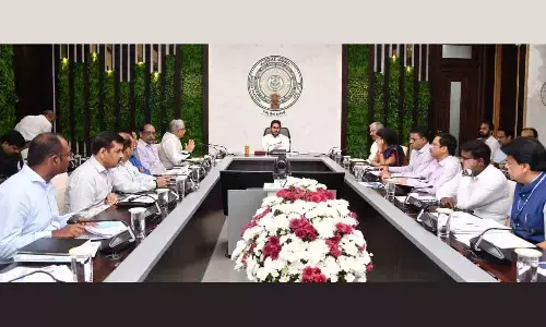 Chief Minister Y S Jagan Mohan Reddy holding a review meeting on the revenue-generating departments at his camp office in Tadepalli on Monday