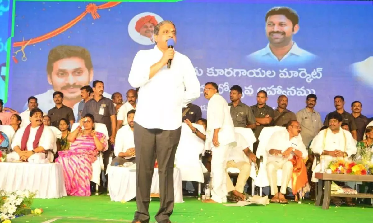 Govt advisor Sajjala Ramakrishna Reddy addressing a public meeting after laying foundation stone for a vegetable market in Proddaturu on Tuesday