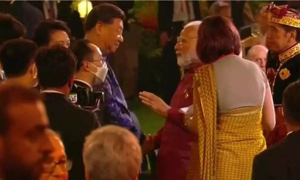 Modi, Xi shake hands at side event at G-20 Summit