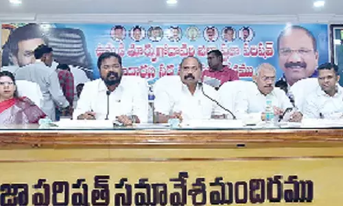 R&B Minister Dadisetti Ramanlingeswar Rao (Raja) addressing ZP meeting in Kakinada on Tuesday. BC Welfare Minister Chelluboina Venu Gopala Krishna, Collectors Krithika Shukla and Himanshu Shukla and ZP Chairman Vipparti Venu Gopal are also seen