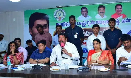 Housing Minister Jogi Ramesh addressing a review meeting in Anantapur on Wednesday. Woman and Child Welfare Minister Usha Sri Charan and others are seen.
