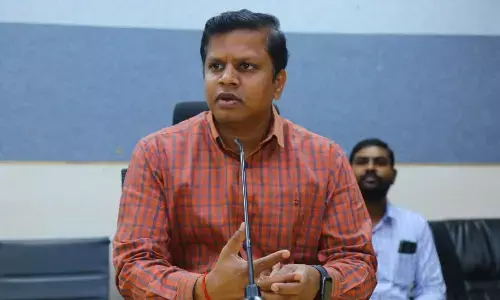 District collector S Krishna Aditya speaking to media persons in Mulugu on Wednesday