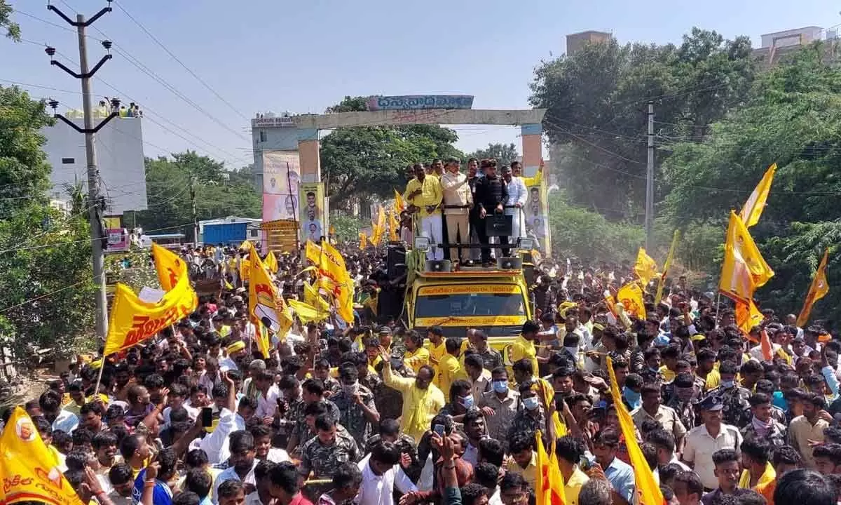 TDP national president N Chandrababu Naidu taking part in a road show at Adoni in Kurnool district on Thursday
