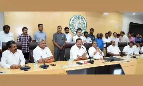 Minister Botcha Satyanarayana addressing employees after inaugurating at the Secretariat on Thursday. Govt advisor (public affairs) Sajjala Ramakrishna Reddy is also seen.