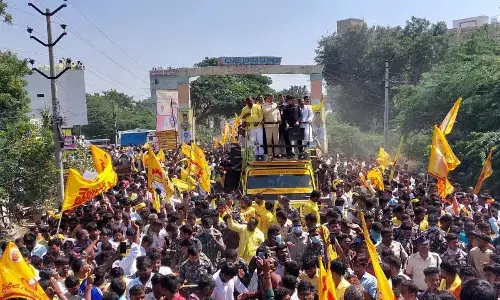 TDP national president N Chandrababu Naidu taking part in a road show at Adoni in Kurnool district on Thursday