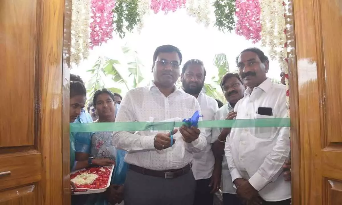 District Collector K V N Chakradhar Babu inaugurating the Sachivalayam building along with RS Member B Mastan Rao and legislator Prasanna Kumar Reddy, in Kodavaluru mandal on Friday