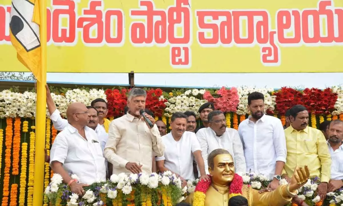 TDP national president N Chandrababu Naidu addressing the crowds after unveiliing the bronze statue of party founder N T Rama Rao at party office in Kurnool on Friday