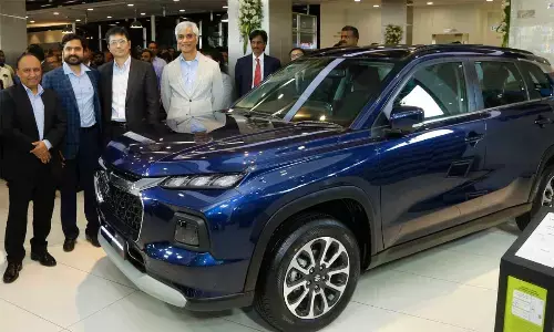 (On left) Shashank Srivastava, Senior Executive Officer, Marketing & Sales, MSIL during the launch of Maruti Suzuki’s 3,500th dealer showroom in Hyderabad on Friday