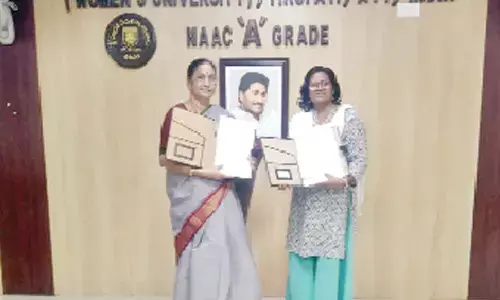 SPMVV V-C Prof D Jamuna and Head of Climate Action Academy M Indira Das exchanging MoU in Tirupati on Friday.