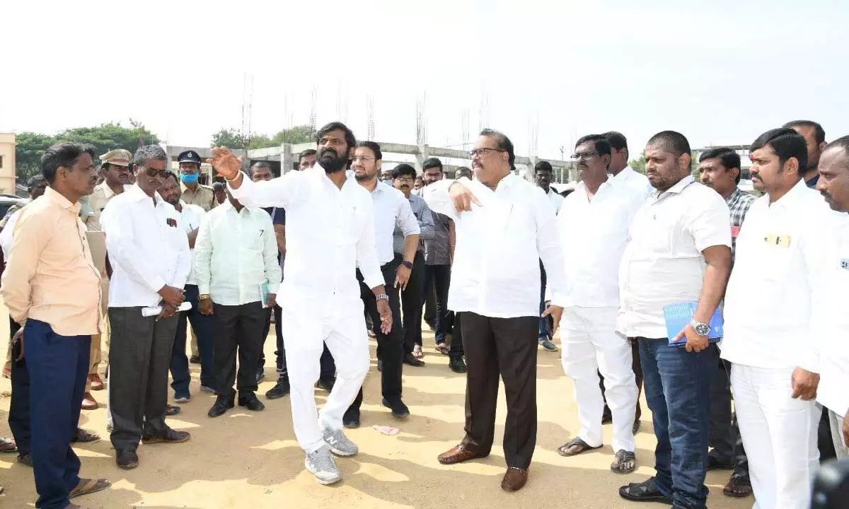 Minister Srinvas Goud and District Collector S Venkat Rao inspecting the MVS College grounds for the upcoming meeting of CM KCR on December 4