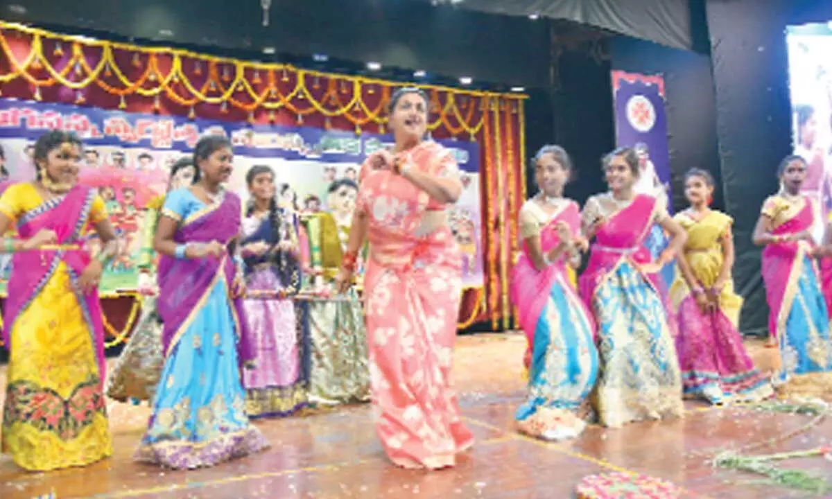 Minister R K Roja dancing with artists at Mahati auditorium in Tirupati on Sunday