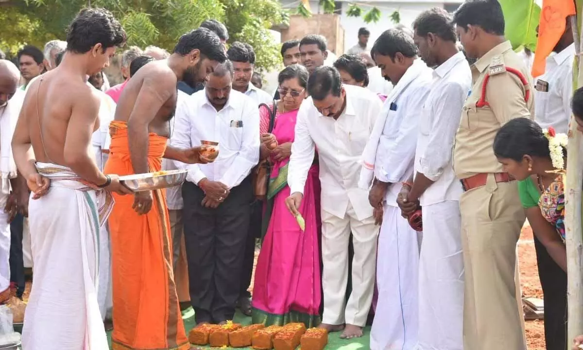 Agriculture Minister Kakani Govardhan Reddy performing Bhumi puja for Venkateswara Swamy temple in Venkatachalam on Sunday