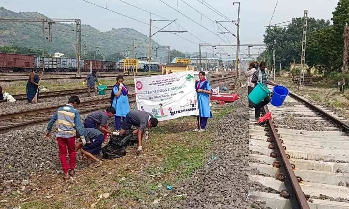 Bharat Scouts and Guides participating in a mega cleanliness drive at Krishna Canal Station at Tadepalli in Guntur district on Sunday