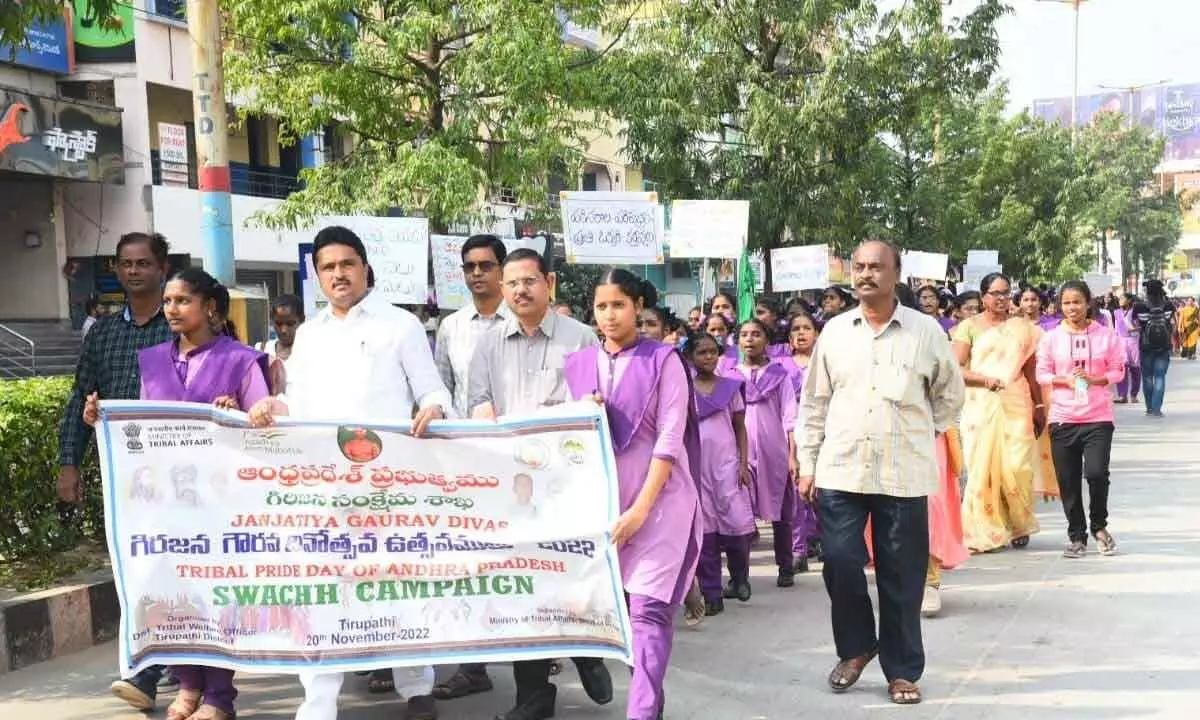 Participants at the ‘Tribal Pride Day’ rally in Tirupati on Sunday