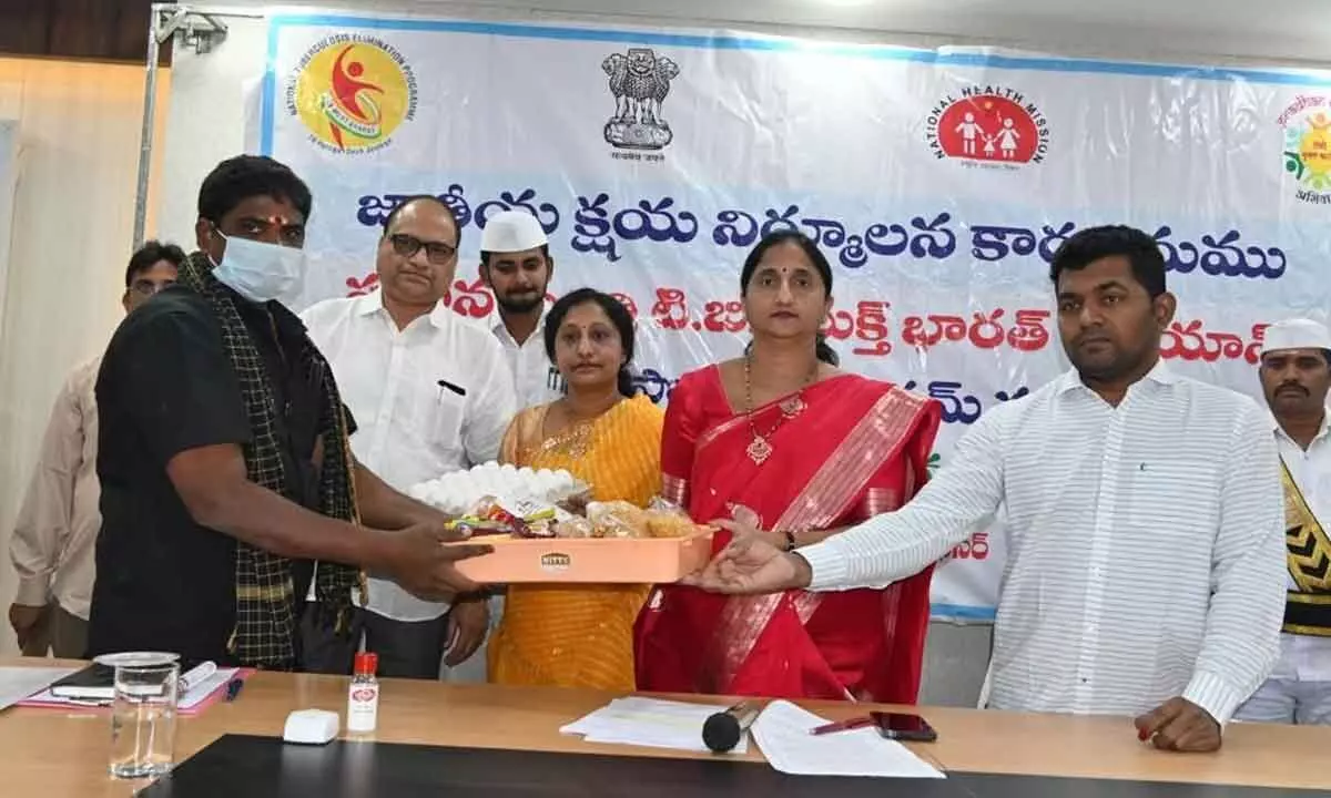 District Collector  K Madhavi Latha distributing a nutritious food kit to a TB patient in Rajamahendravaram on Monday