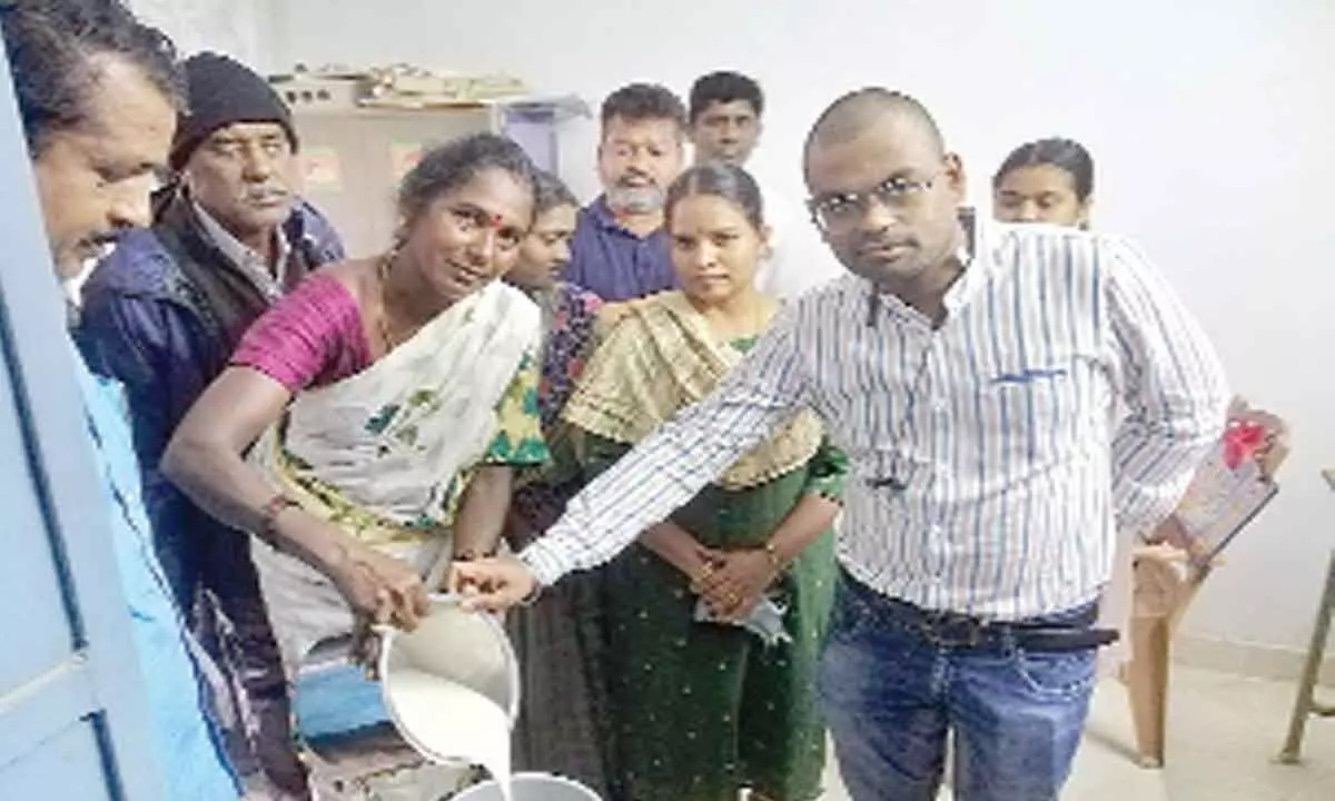 Joint Collector DK Balaji taking part in the Jagananna Pala Velluva programme at Kayam village of Vadamalapet mandal on Monday